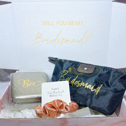 Our gift box includes personalized items like make up bag, travel jewelry box, and message scrunchies, offering a thoughtful and stylish gift for any special occasion.