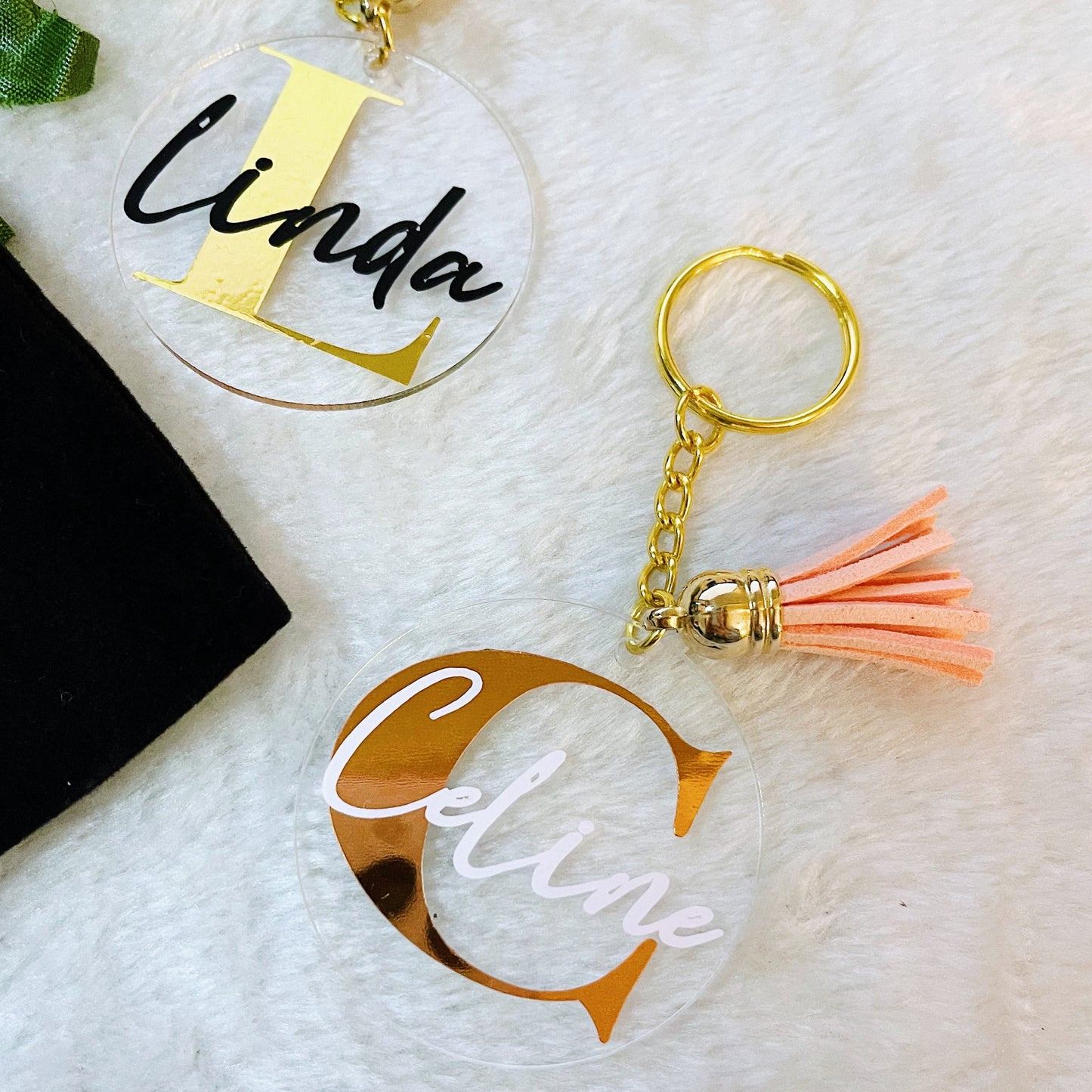 Discover the perfect personalized acrylic keyring for kids or flower girls, featuring custom vinyl names, available in various tassel colors, and packaged in a black velvet pouch—ideal for any special occasion.