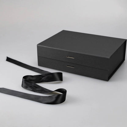 Experience the elegance and convenience of our Black Ribbon Magnetic Box, ideal for stylish gift presentations, wedding proposals, or sophisticated packaging solutions for your small business.