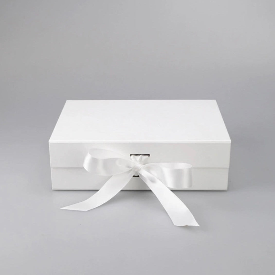 Our white ribbon magnetic gift box is ideal for birthdays, groomsman/ best man proposals, Christmas gifts, and more.