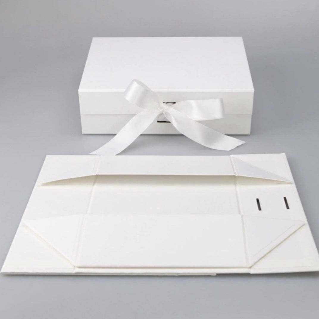 Our white ribbon magnetic gift box is ideal for birthdays, groomsman/ best man proposals, Christmas gifts, and more.