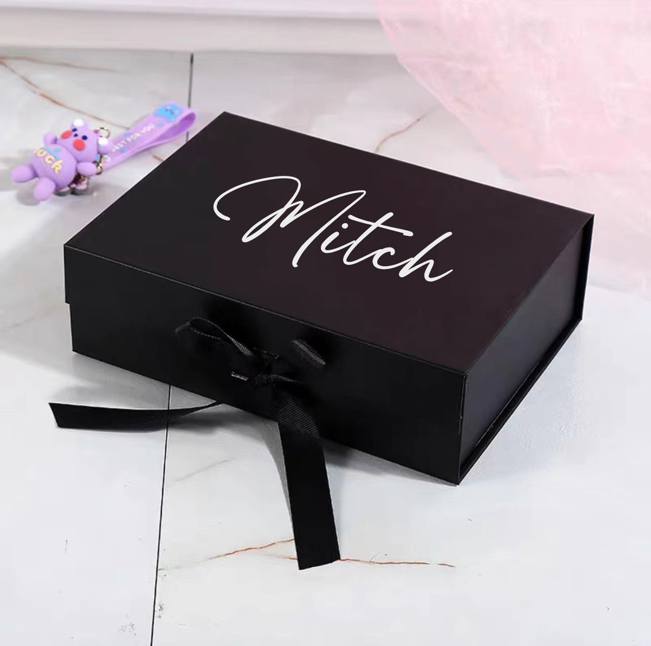 Experience the elegance and convenience of our Black Ribbon Magnetic Box, ideal for stylish gift presentations, wedding proposals, or sophisticated packaging solutions for your small business.