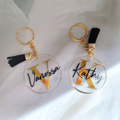 Discover the perfect personalized acrylic keyring for kids or flower girls, featuring custom vinyl names, available in various tassel colors, and packaged in a black velvet pouch—ideal for any special occasion.