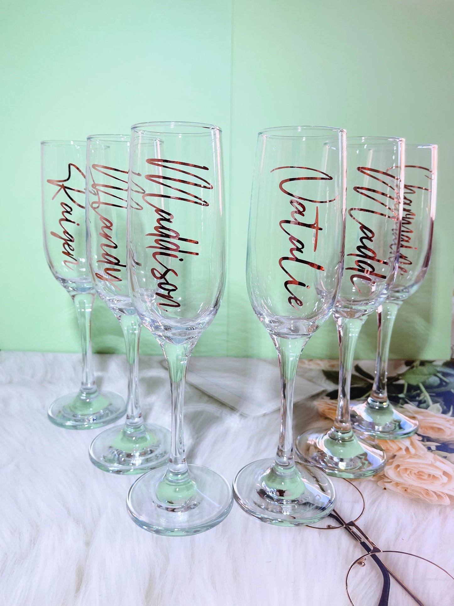 Our personalized gift box, perfect for any special occasion, includes a customized box, card, champagne flute or stemless glass, and message scrunchies, available in elegant Marble Pink or White Ribbon.