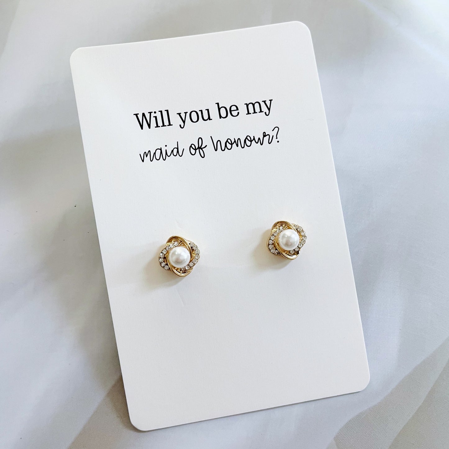 Looking for the perfect bachelorette gift? Look no further! Our customisable gift card paired with 14k gold plated earrings is exactly what you've been searching for.